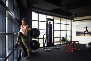 Woman stretching in apartment fitness