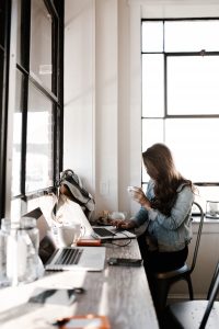 woman working at cafe